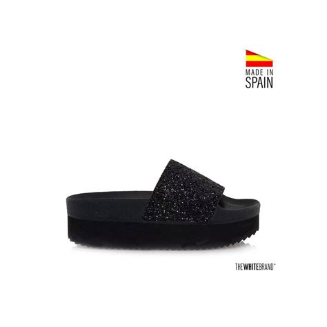 Chanclas negras plataforma Continuara.org