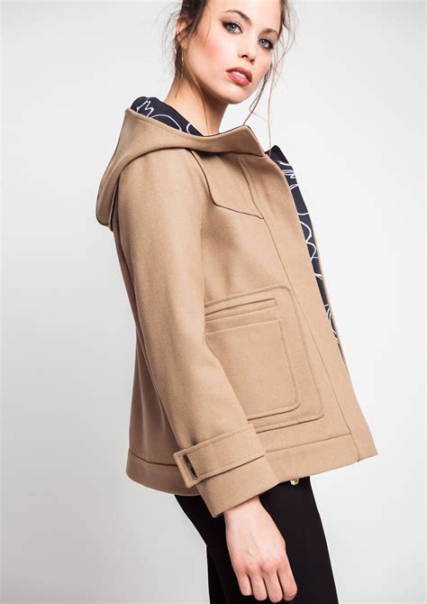 Chaqueta camel Continuara.org