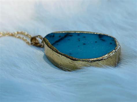 Colgante piedra azul Continuara.org