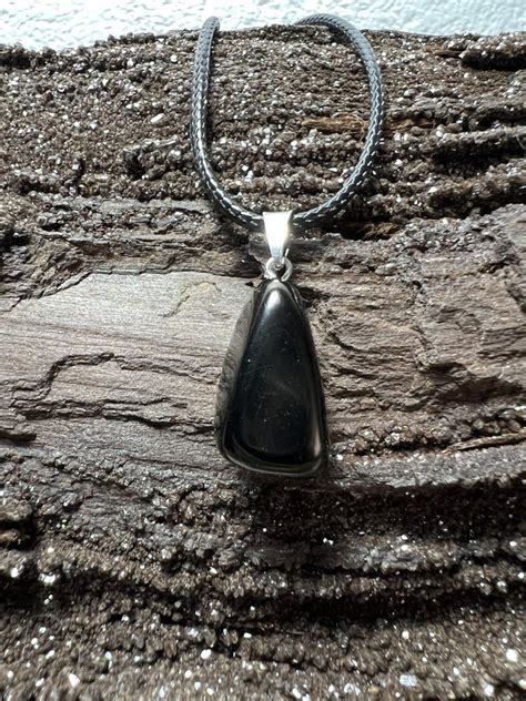 Colgante plata azabache Continuara.org