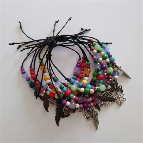 Colgante pulsera hilos Continuara.org