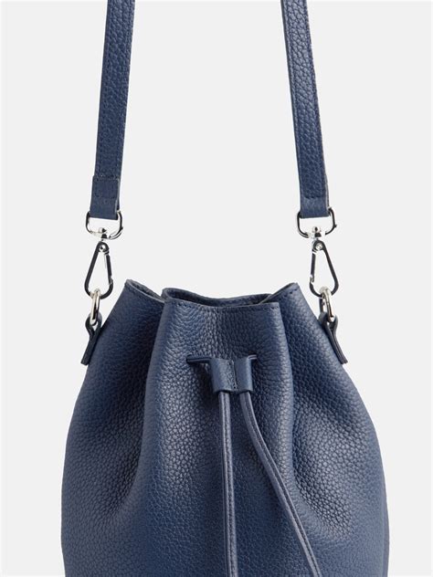 Conjunto bolso saco Continuara.org