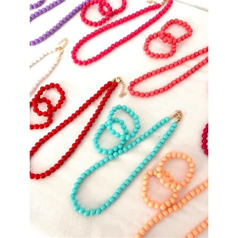 Conjunto pulsera colgante Continuara.org