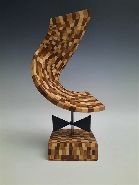 Escultura abstracta madera Continuara.org