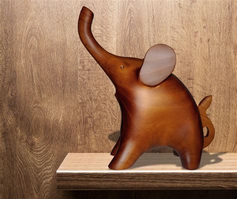 Escultura madera elefante Continuara.org
