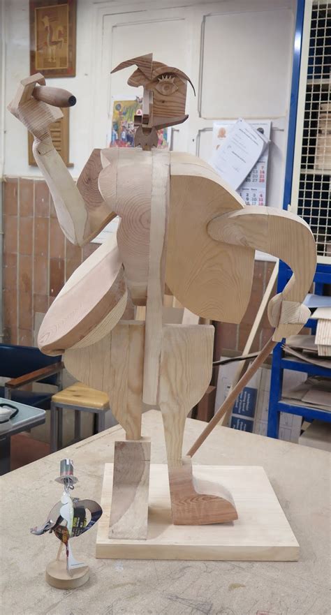 Escultura madera Continuara.org