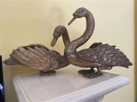 Figuras cisnes bronce Continuara.org