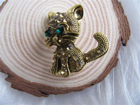 Gatito broche cristal Continuara.org