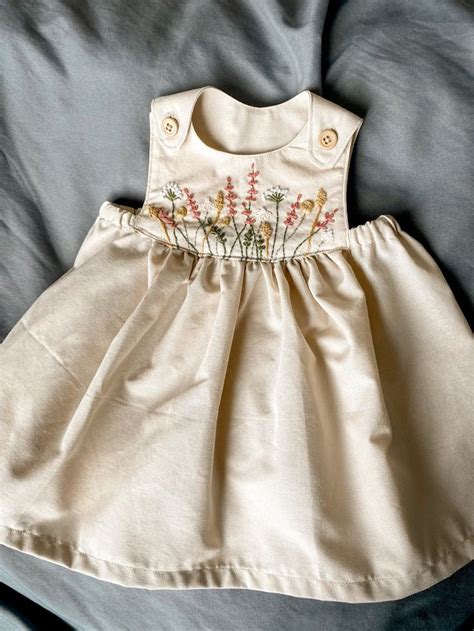 Handmade baby dress Continuara.org