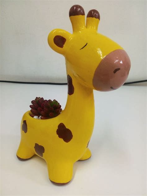 Jirafa ceramica nueva Continuara.org