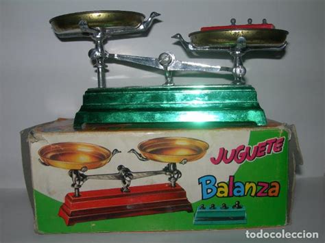 Juguete antiguo balanza Continuara.org