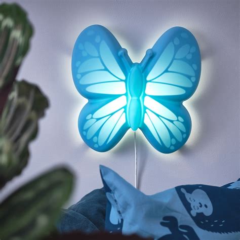 Lampara pared mariposa Continuara.org