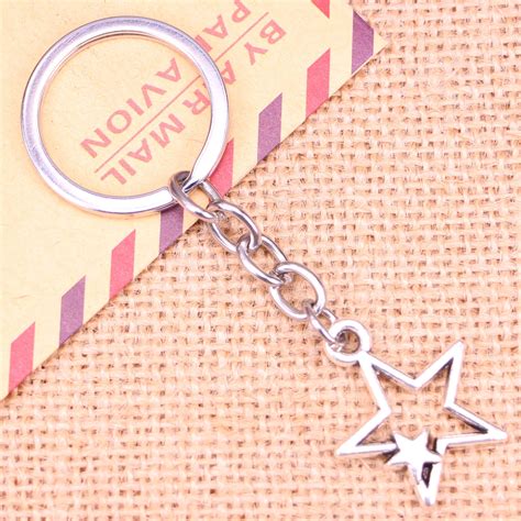 Llavero colgante estrella Continuara.org