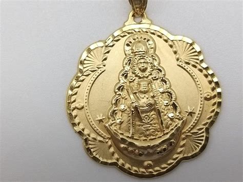 Medalla virgen rocio Continuara.org