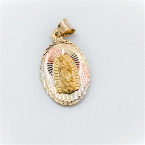 Medallon virgen Continuara.org