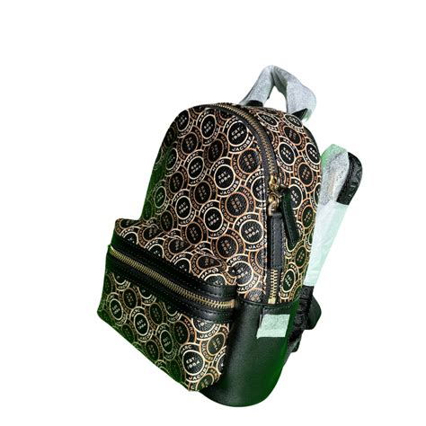Mochila negra dorada Continuara.org