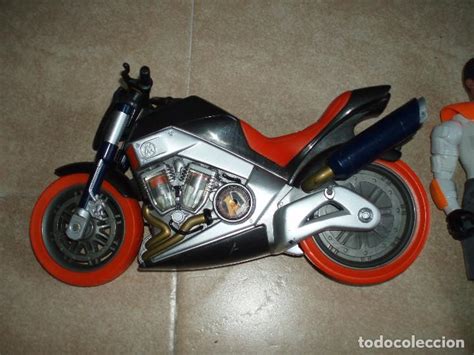 Moto muneco action Continuara.org