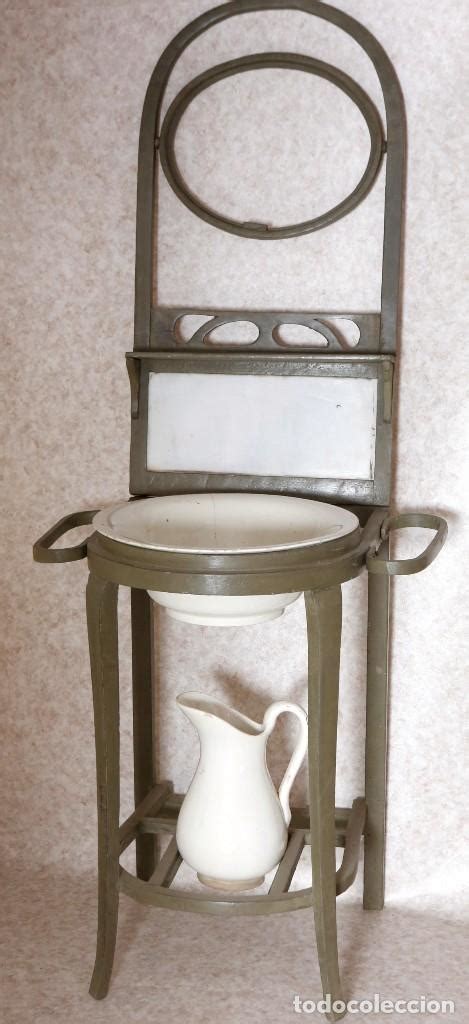 Mueble antiguo jarra Continuara.org