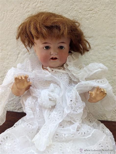 Muneca antigua porcelana Continuara.org