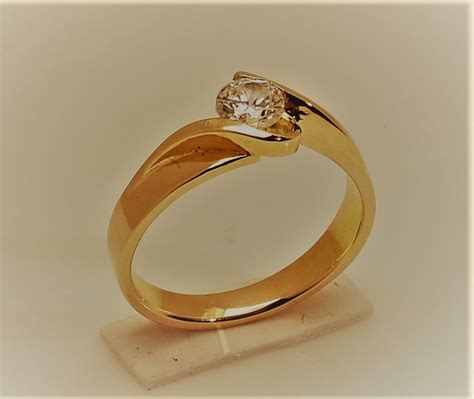 Oro 18 kilates Continuara.org