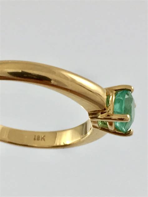 Oro 18k esmeralda Continuara.org