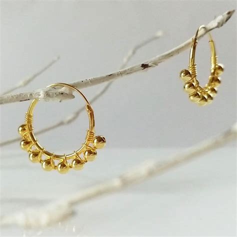 Pendientes bolitas oro Continuara.org
