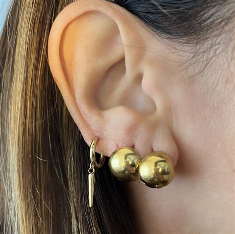 Pendientes bolitas Continuara.org