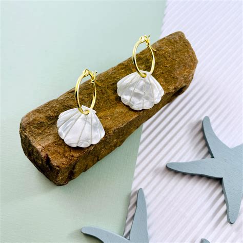 Pendientes conchitas Continuara.org