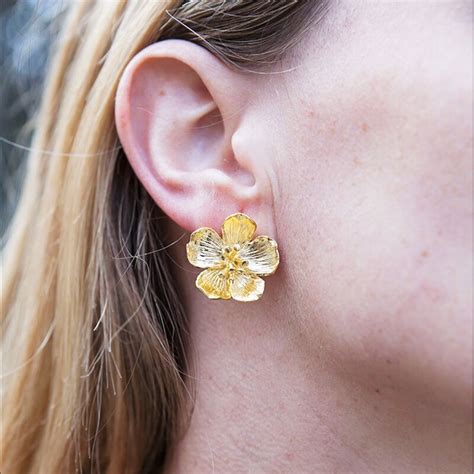 Pendientes flor Continuara.org