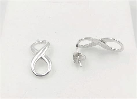 Pendientes infinito plata Continuara.org