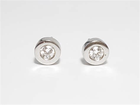 Pendientes oro blanco Continuara.org