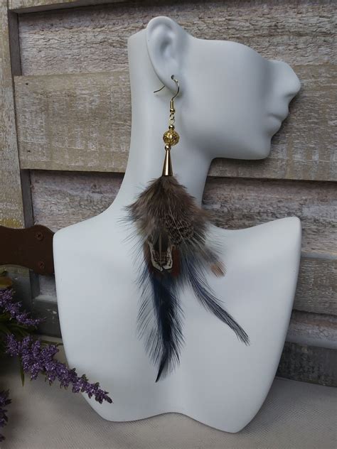 Pendientes plumas Continuara.org