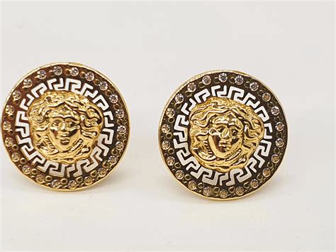 Pendientes versace Continuara.org