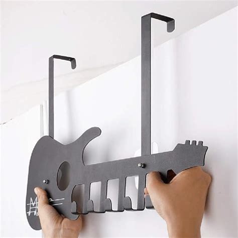 Perchero pared guitarra Continuara.org