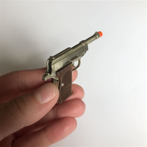 Pistola miniatura Continuara.org