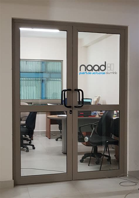 Puerta aluminio doble Continuara.org