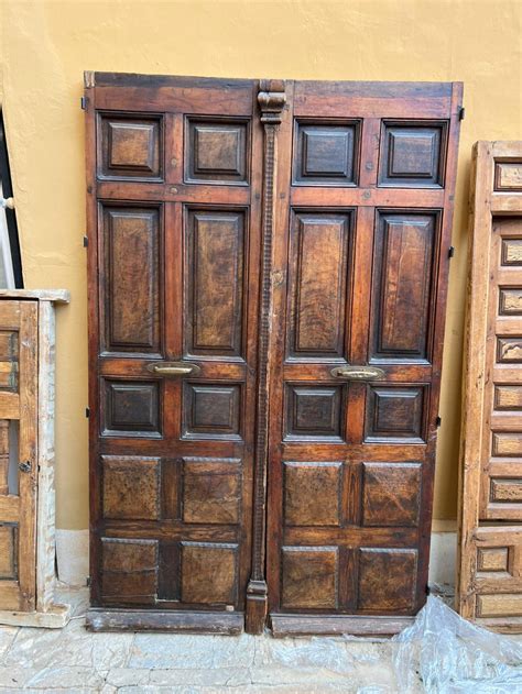Puerta castano Continuara.org