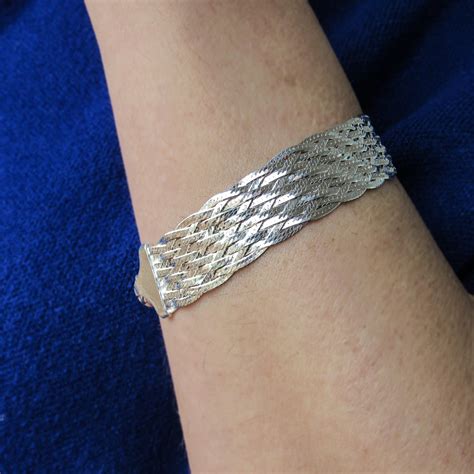 Pulsera ancha plateada Continuara.org