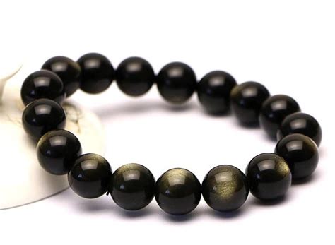 Pulsera obsidiana dorada Continuara.org