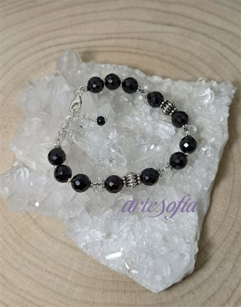 Pulsera plata onix Continuara.org