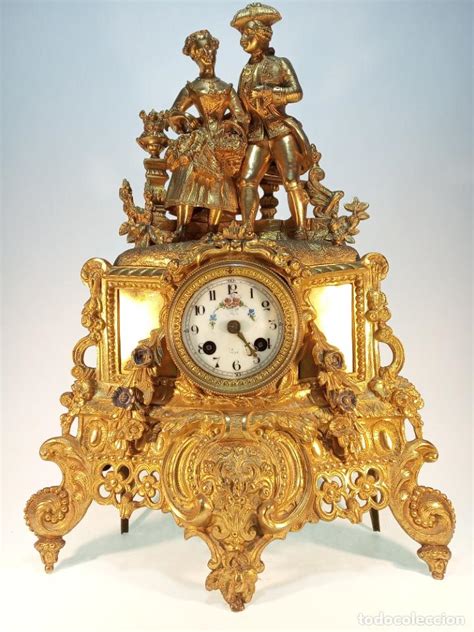 Reloj bronce sobremesa Continuara.org