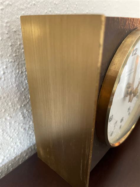 Reloj laton aleacion Continuara.org