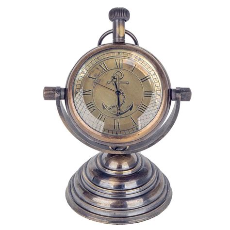 Reloj mesa laton Continuara.org