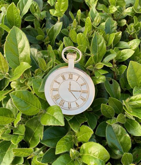 Reloj metacrilato dorado Continuara.org