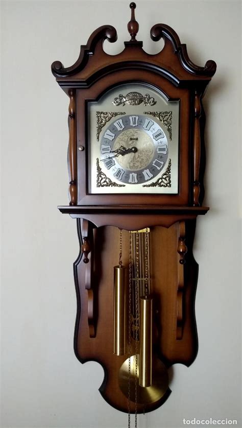 Reloj pared carga Continuara.org