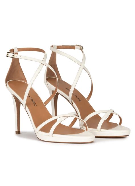 Sandalias blancas Continuara.org
