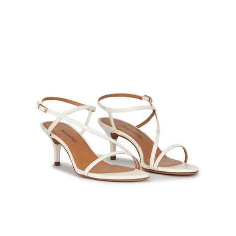 Sandalias blanco Continuara.org