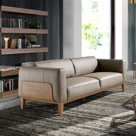 Sofa madera cuero Continuara.org