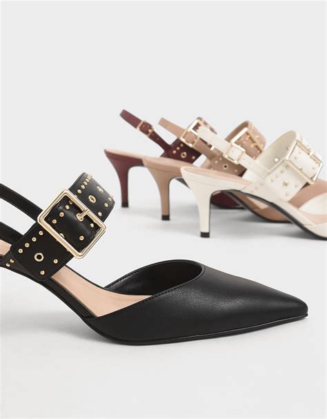 Tacones negros tachuelas Continuara.org