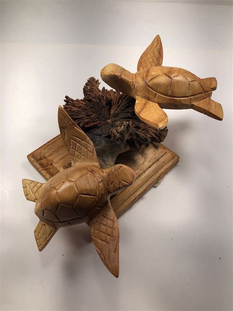 Tortugas talladas madera Continuara.org